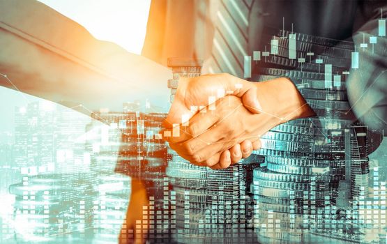 Business handshake on finance prosperity and money technology asset background . Economy and financial growth by investment in valuable stock market to gain wealth profit form currency trading