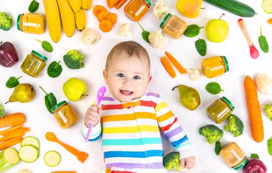 Baby food puree with vegetables and fruits. Selective focus. nutrition.
