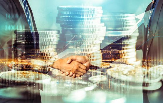 Business handshake on finance prosperity and money technology asset background . Economy and financial growth by investment in valuable stock market to gain wealth profit form currency trading
