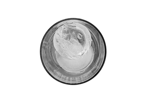 Top view of a clear glass with two round ice cubes isolated on a white background