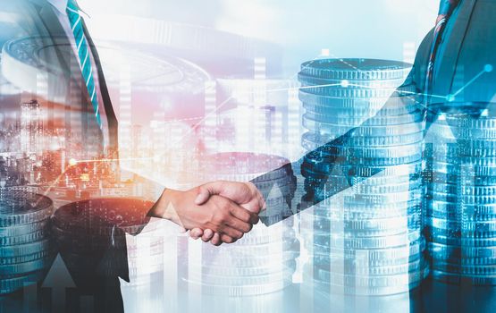 Business handshake on finance prosperity and money technology asset background . Economy and financial growth by investment in valuable stock market to gain wealth profit form currency trading