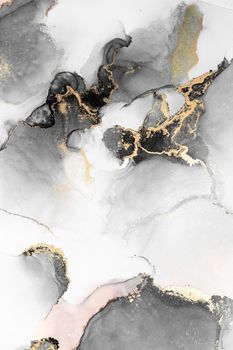 Black gold abstract background of marble liquid ink art painting on paper . Image of original artwork watercolor alcohol ink paint on high quality paper texture .