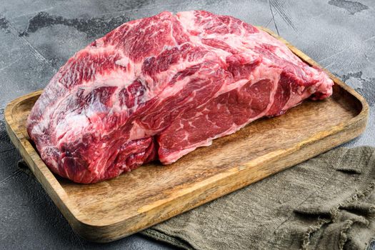 Raw fresh meat Ribeye steak entrecote of Black Angus Prime meat set, on gray stone background