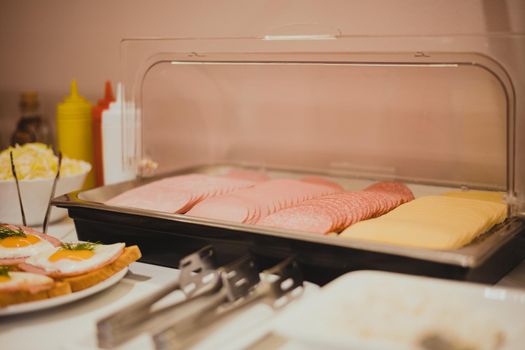 Buffet trays with a various breakfast hotel meals set