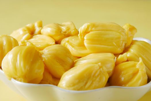 top view of slice of jackfruits in a bowl on table