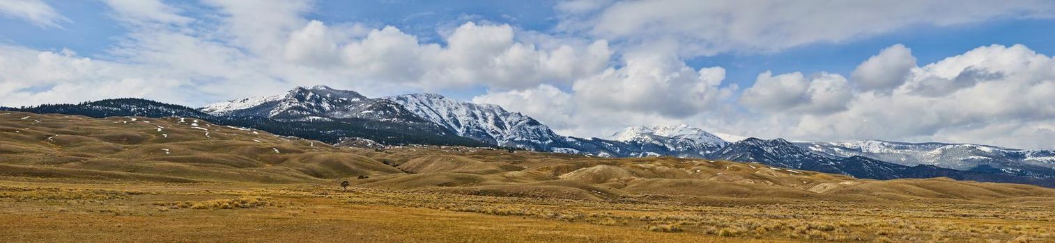 Image of Panorama of fields in west lined with snowy mountains