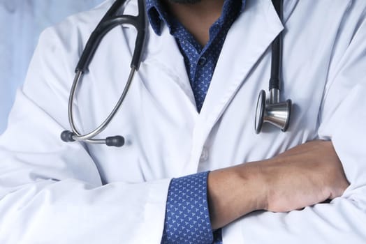 doctor with stethoscope in hand with copy space