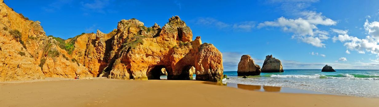 Panorama from natural rocks at Praia Tres Irmaos in Alvor in the Algarve Portugal