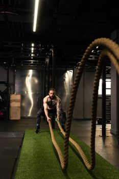 Rope fitness man training gym beard battle fit strength workout, for active body from effort from person working, bodybuilder energy. Weight beautiful battling, men