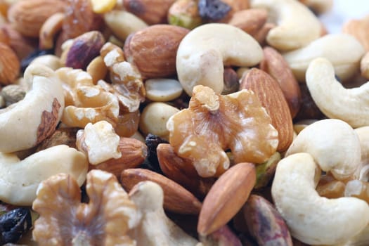 selective focus. close up of fresh mixed nut in a bowl .