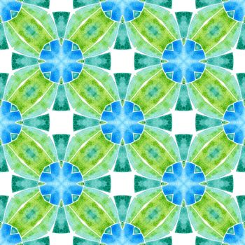 Ikat repeating swimwear design. Green indelible boho chic summer design. Textile ready impressive print, swimwear fabric, wallpaper, wrapping. Watercolor ikat repeating tile border.