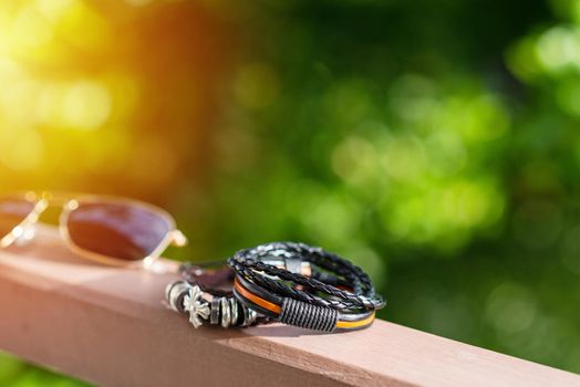 closeup leather bracelets for men, casual style of men accessories. Shallow depth of field.