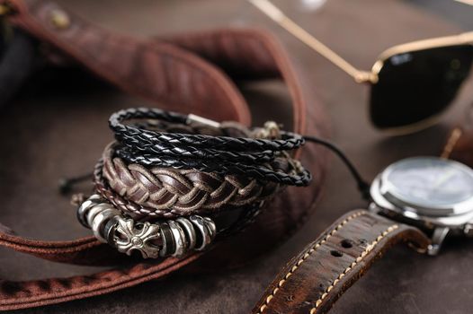 closeup leather bracelets for men, casual style of men accessories. Shallow depth of field.