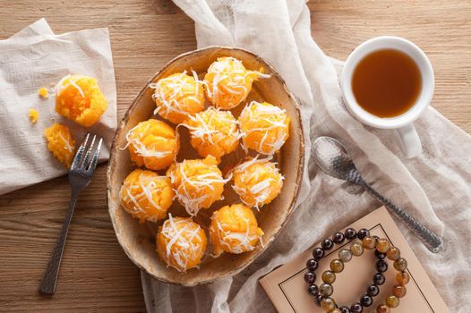 Toddy palm cake or Kanom Tan, Thai traditional dessert. Khanom tan is made from rice flour, ripe sugar palm fruit, coconut milk, scraped coconut, sugar and salt.