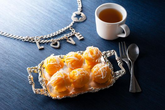 Toddy palm cake or Kanom Tan, Thai traditional dessert. Khanom tan is made from rice flour, ripe sugar palm fruit, coconut milk, scraped coconut, sugar and salt.