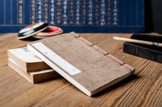 closeup vintage style of Japanese stab binding on wooden desk