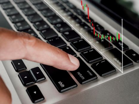 Close up hand Businessman touch enter on laptop keyboard show graph stock market bar chart grow up to target. Business finance concept Businessman analysis and success graph stocks grow set goals
