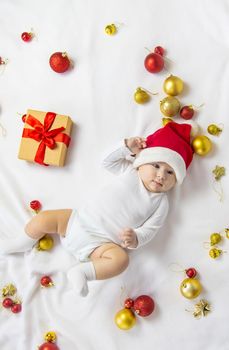 Christmas photo of baby with New Year's decor. selective focus. holiday.