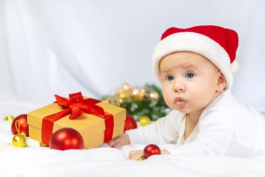 Christmas photo of baby with New Year's decor. selective focus. holiday.
