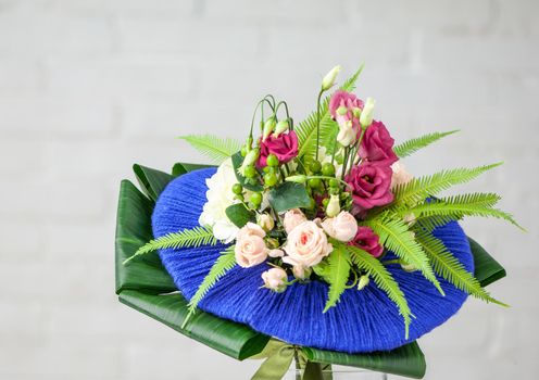 A beautiful bouquet with white roses and pink lisianthus