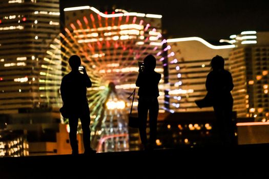 Minato Mirai Night View and People Silhouette. Shooting Location: Yokohama-city kanagawa prefecture