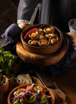 A shot of a person putting dishes on the table