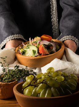 A vertical picture of a dish in hands