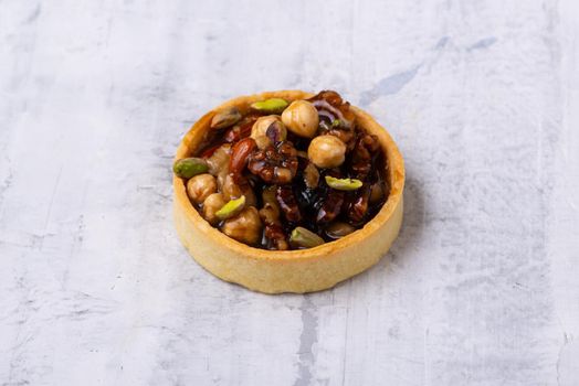 A delicious tartlet filled with nuts