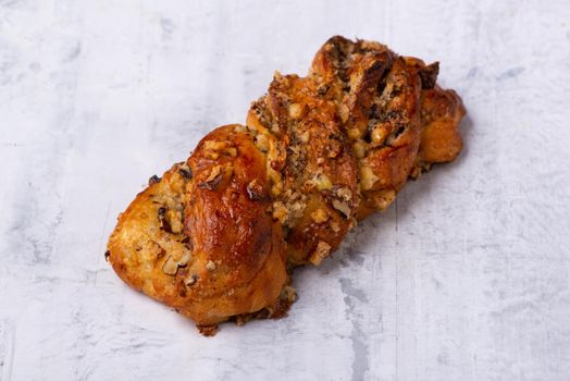 A top view shot of Challah bread on a white surface