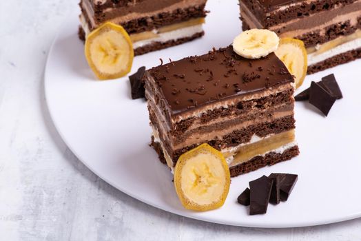 A serving of delicious chocolate cake pieces on a white plate