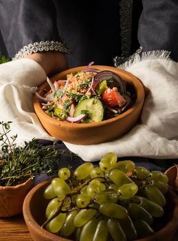 A vertical picture of a dish in hands