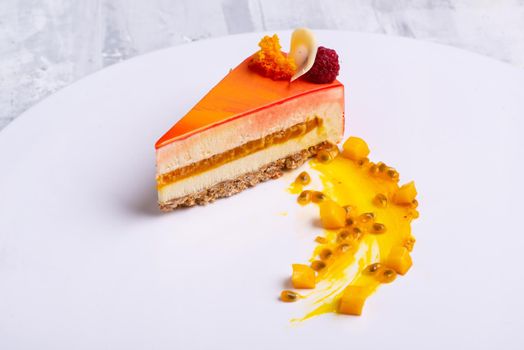 A top view shot of sliced orange cakes on a white surface