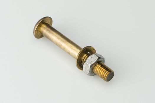 A closeup shot of a bolt isolated on a white background