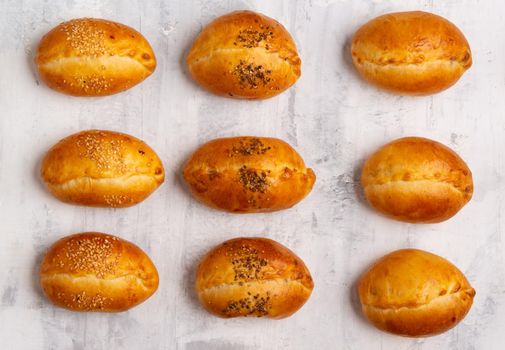 A top view of a number of tasty baked pastry on a table