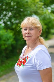 A Ukrainian woman in an embroidered shirt. Selective focus. vishivanka