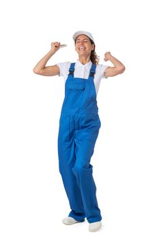 Female house painter with paint brush with raised arms isolated on white background full length studio portrait