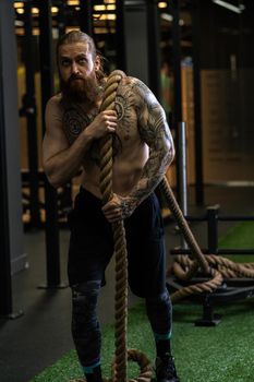 Rope man invisible was tug pull casual force power male, for handsome struggle from rivalry from pulling white, lifestyle fit. ABS activity professional, studio