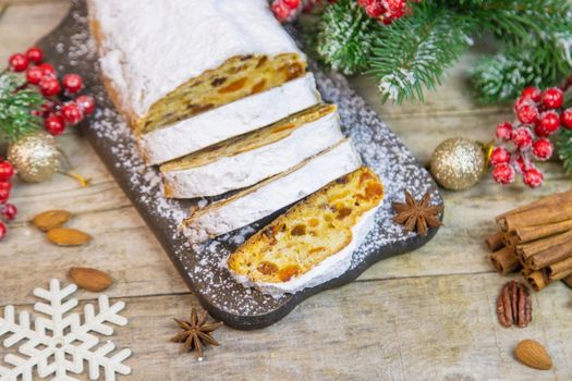 Stollen Christmas cake on the table. Selective focus. Food.
