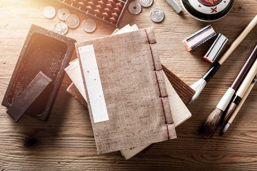 closeup vintage style of Japanese stab binding on wooden desk