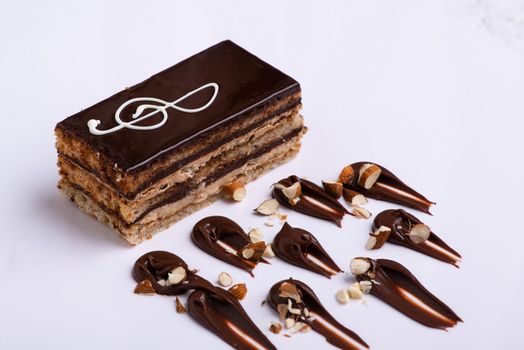 A serving of delicious chocolate cake pieces on a white plate