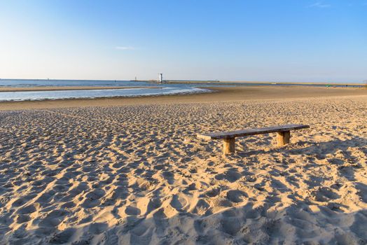 Bench on the beach at Baltic sea in Swinoujscie in Poland
