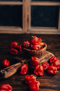 Ripe Habanero Peppers on a Wooden Surface