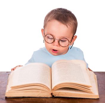 Cute little girl with open books in her hands