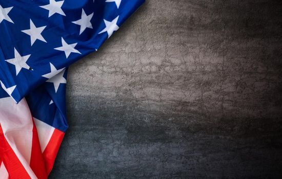 American flag on dark background.