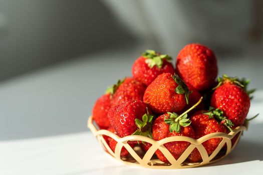 strawberries in a wicker plate.