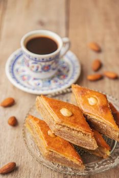 A cup of Turkish coffee and baklava. Selective focus. Drink.
