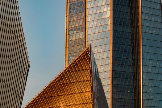 Russia, St. Petersburg, 10 June 2022: The skyscraper Lakhta center of the gas company Gazprom at sunset, glass and iron facade. High quality photo