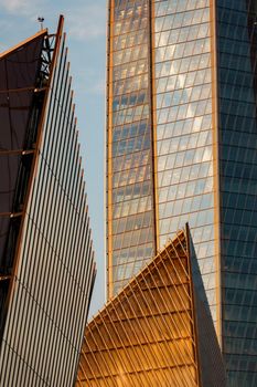 Russia, St. Petersburg, 10 June 2022: The skyscraper Lakhta center of the gas company Gazprom at sunset, glass and iron facade. High quality photo