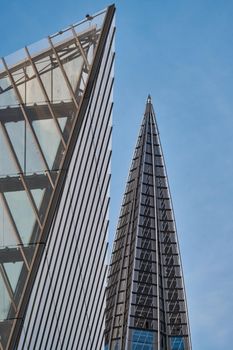 Russia, St. Petersburg, 10 June 2022: The spire of skyscraper Lakhta center of the gas company Gazprom at sunset, glass and iron facade. High quality photo