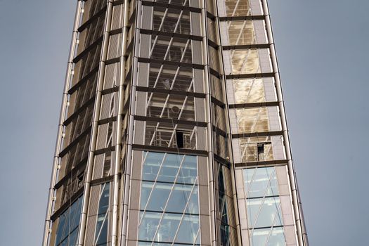 Russia, St. Petersburg, 10 June 2022: The skyscraper Lakhta center of the gas company Gazprom at sunset, glass and iron facade. High quality photo